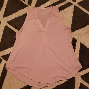 Light blush sleeveless blouse
